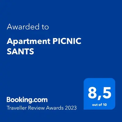 a blue sign with the text awarded to appointment picnic saints at Apartment PICNIC SANTS in Barcelona