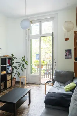a living room with a couch and a table at 360 Hostel Borne in Barcelona