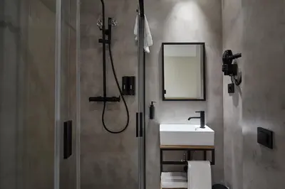 a bathroom with a shower and a sink at Ella Hostel Ramblas in Barcelona