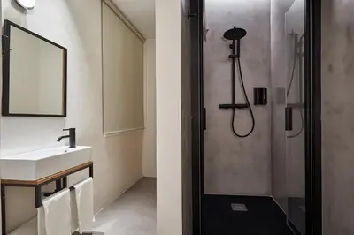 a bathroom with a sink and a shower at Ella Hostel Ramblas in Barcelona