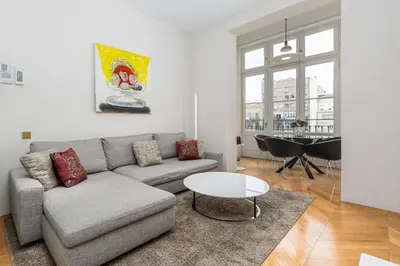 a living room with a couch and a table at Luxury Paseo de Gracia Casa Batlló in Barcelona