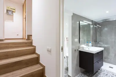 a bathroom with a sink and a shower at Stay U-nique Apartments Travessera II in Barcelona