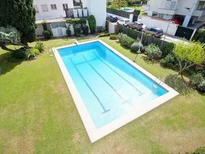 an overhead view of a swimming pool in a yard at Sitges with pool near beach by Hello Homes Sitges in Sitges