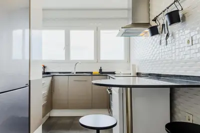 a kitchen with a sink and a counter top at Impresionante Apartamento delante del Mar in Vilassar de Mar