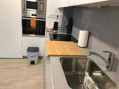 a kitchen with a sink and a counter top at Llull Home in Sant Adria de Besos