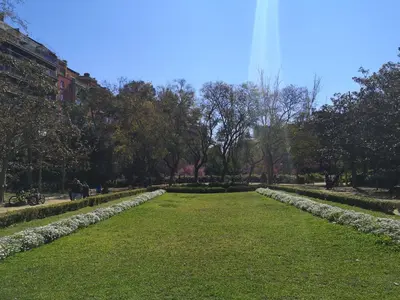 a park with green grass and rocks and trees at ApartEasy - Turo Park with lovely balcony in Barcelona