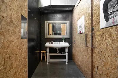 a bathroom with a sink and a mirror at THE LOFT - with private pool & jacuzzi in Corbera de Llobregat