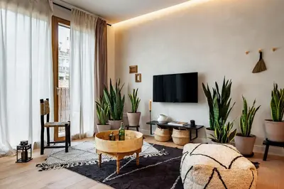 a kitchen with a counter with a sink at BENI - 1 bedroom apartment with pool and terrace in Gracia in Barcelona