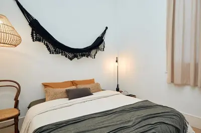 a room with white shelves and a door at SAPO - Two bedroom in the heart of Barcelona in Barcelona