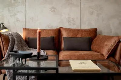 a dining room with a table and chairs in a room at NEVIS - Modern two bedroom apartment in Sagrada Familia in Barcelona