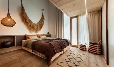 a bedroom with a bed and a window at AMAZONAS - Three bedroom duplex in Gracia in Barcelona