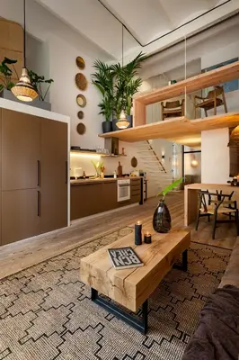 a bedroom with a bed and a large window at AMAZONAS - Three bedroom duplex in Gracia in Barcelona