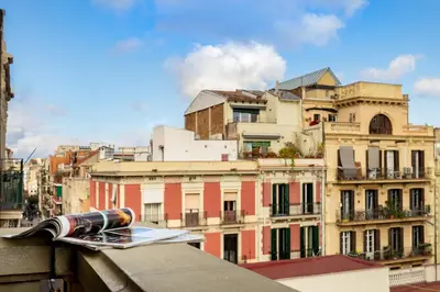 a bathroom with a white toilet and a sink at ROVIRA - One bedroom apartment in Penedes in Barcelona