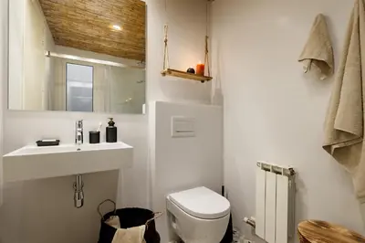 a living room with a couch and a table at HIDALGO - Two bedroom apartment in Eixample in Barcelona