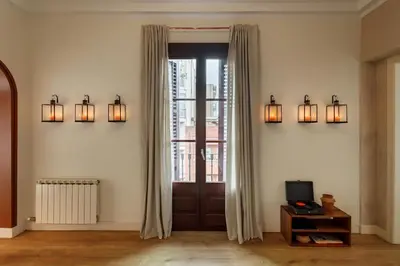 a bathroom with a toilet and a sink and a shower at HIDALGO - Two bedroom apartment in Eixample in Barcelona