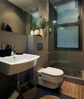 a bathroom with a white sink and a toilet at ERAWAN - One bedroom apartment in Eixample in Barcelona