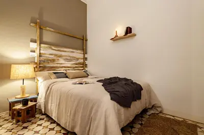a bathroom with a toilet and a glass shower at LEGE - Two bedroom apartment in Mallorca St in Barcelona