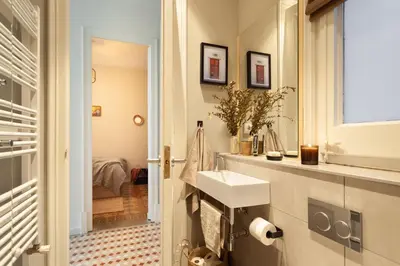 a living room with a couch and a table at MILOS - Two bedroom apartment in Mallorca St in Barcelona
