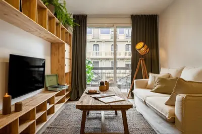 a view from a balcony of buildings in a city at TAMAN - Three Bedroom Apartment in Casanova Street in Barcelona