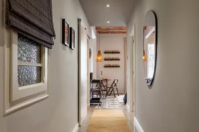 a bathroom with a sink and a mirror at NANAY - Two bedroom apartment in Gracia in Barcelona