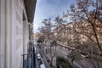 a view of a street from a balcony of a building at Sweett - Casa Palau in Barcelona
