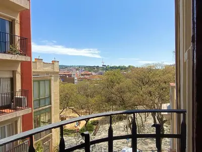 a view of a city from a balcony at Sants Montjuic Olympic View in Barcelona