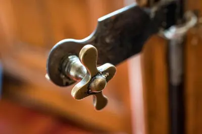 a metal door latch with a knob on it at Habitat Apartments Ferran in Barcelona
