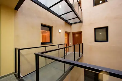 a staircase in a house with a glass ceiling at Habitat Apartments Carders in Barcelona