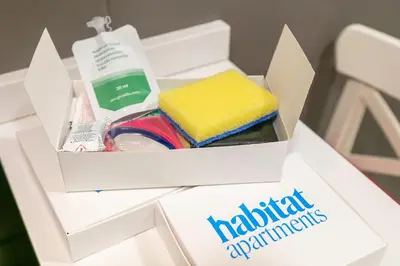a white box with different items in it at Habitat apartments Barcelona Center in Barcelona