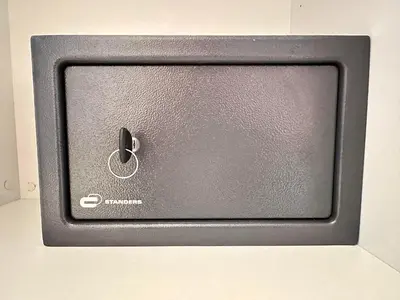 a small black tv with an apple logo on it at True Design in Heart of Noble BCN in Barcelona