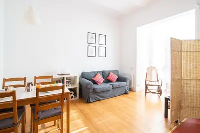 a living room with a couch and a table at Barcelona cozy apartment in Barcelona