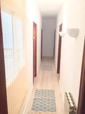 an empty hallway with a hallwayngthngthngthngthngthngthngthngthngthngth at SITGES Apartment PALLARÉS in Sitges