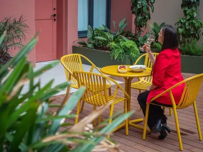 a table with plates of breakfast food on it at ARCELON HOTEL - From 2023 in Barcelona
