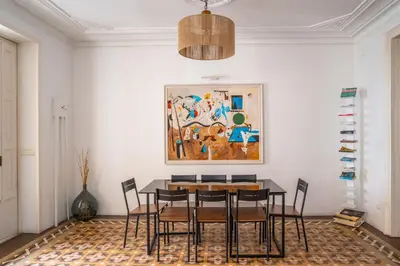 a dining room with a table and chairs at The Collection Barcelona - Ronda Sant Pere in Barcelona