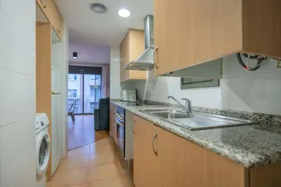 a group of tall buildings in a city at The Collection Barcelona - 2 bedroom Duplex apartment with balcony 4-3 in Barcelona