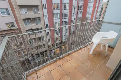 a room with two beds and a hallway at The Collection Barcelona - 2 bedroom Duplex apartment with balcony 4-3 in Barcelona