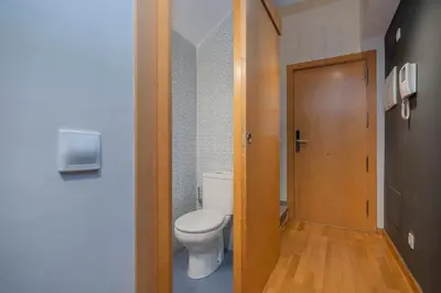 a living room with a couch and a table and chairs at The Collection Barcelona - 2 bedroom Duplex apartment with balcony 4-3 in Barcelona