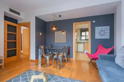 a kitchen with a washing machine and a washer at The Collection Barcelona - Modern and bright apartment in Eixample 5-1 in Barcelona