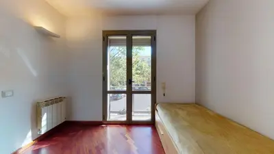 a room with a bed in a room with a window at The Collection Barcelona - Modern and bright three-bedroom in Eixample in Barcelona