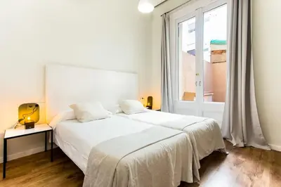 a bathroom with a sink and a toilet and a shower at The Collection Barcelona - Bright and modern 4bedroom with terrace in Las Ramblas P1 in Barcelona