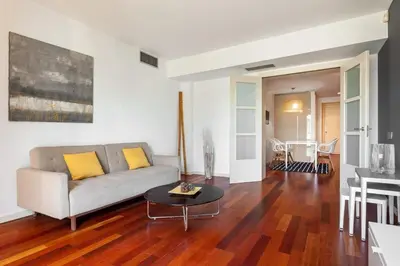 a bathroom with a glass sink and a shower at The Collection Barcelona - Plaça Catalunya Modern 2bedroom with balcony in Barcelona
