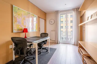 an office with a desk and chairs and a window at The Collection Barcelona - Classy 3bed 3bath apartment in Eixample in Barcelona