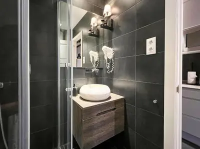 a bathroom with a shower with a toilet and a sink at Stay U-nique Apartments Est in Barcelona