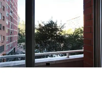 a view from a window of a city street at GOOD APARTMENTS gran via 3 bedrooms in Barcelona