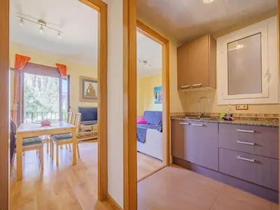 a kitchen with a table and a dining room at Absolute Sagrada Familia in Barcelona