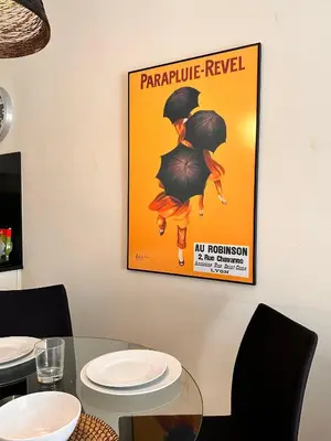 a picture of a movie poster on a wall at Gracia Barcelona Apartment in Barcelona