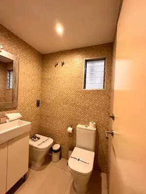 a bathroom with a toilet and a sink at Gracia Barcelona Apartment in Barcelona