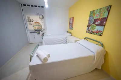 a hospital room with a bed in a room at HomeHolidaysRentals Milos - Costa Barcelona in Pineda de Mar