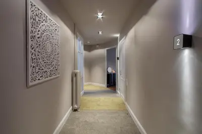an empty hallway with a hallway at BacHome Gallery B&B in Barcelona