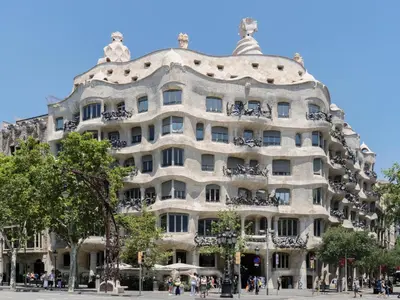 a large white building with bikes on it at Modernismo Paseo de Gracia in Barcelona